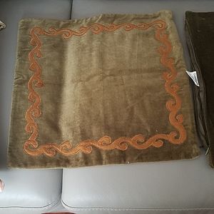 Two Crate and Barrel pillow covers